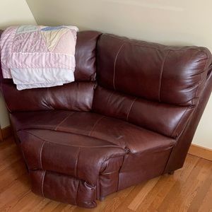 Genuine leather corner piece. Nothing wrong with it, just  taking up space.